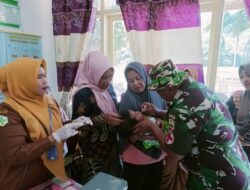 Layani Kesehatan, Tim Keslap Satgas TMMD ke 121 Gelar Posyandu