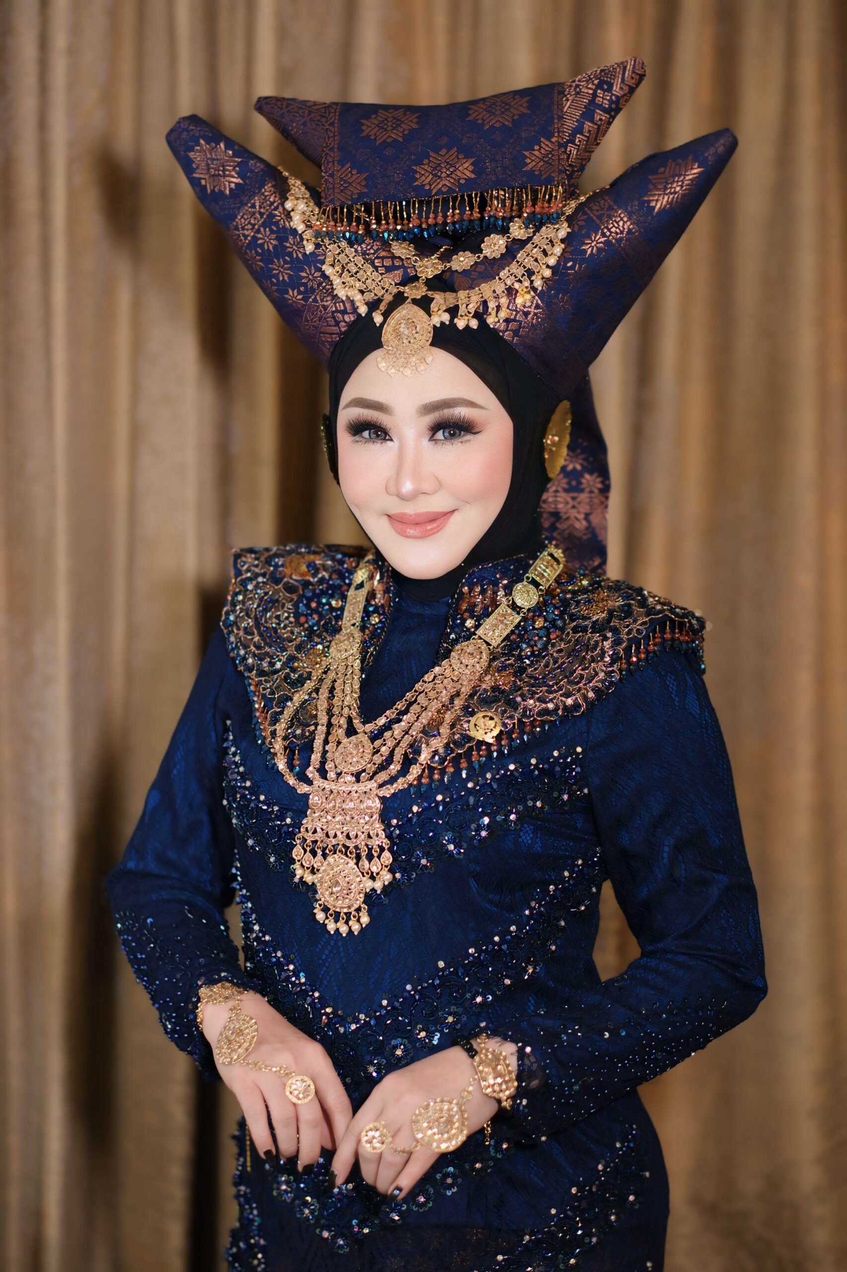 Dr H Lisda Hendrajoni, S.E, M.M.Tr.